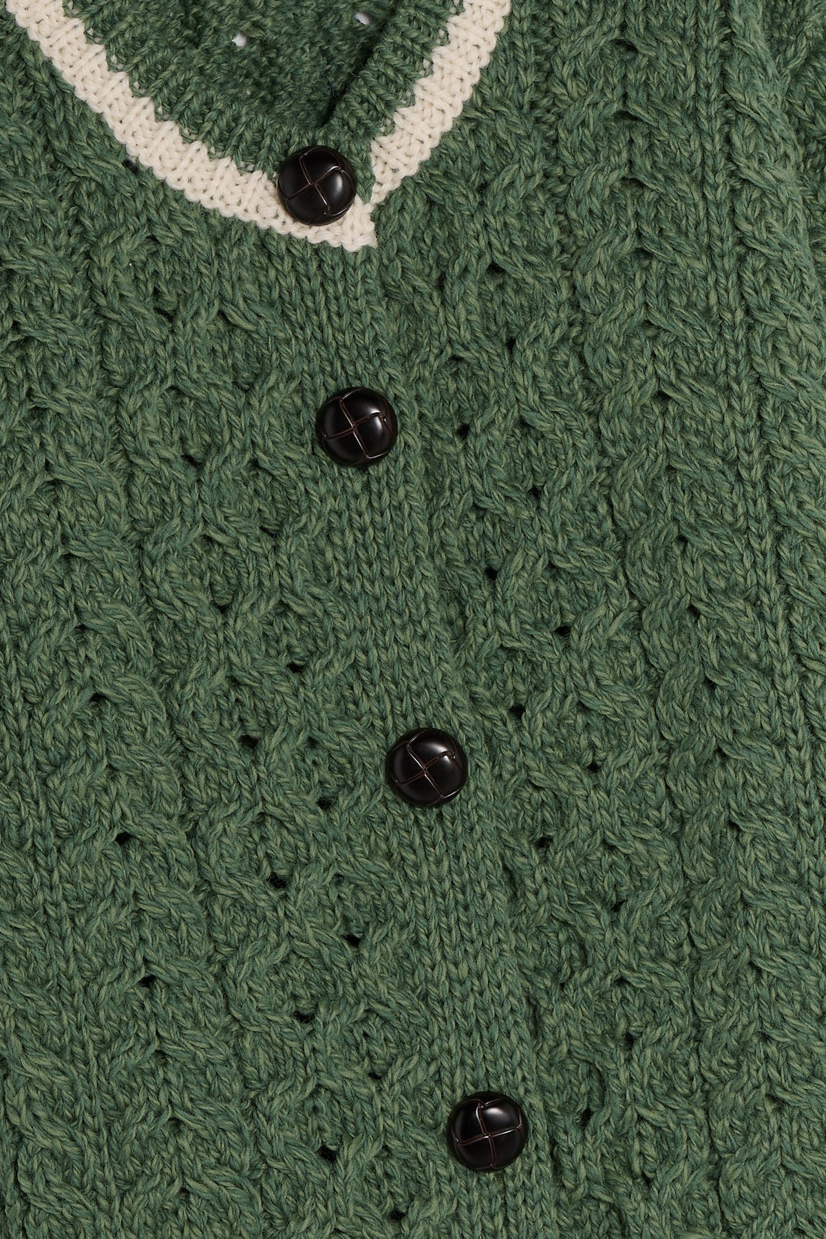 Aran baby cardigan verde dettaglio Lady De Paz